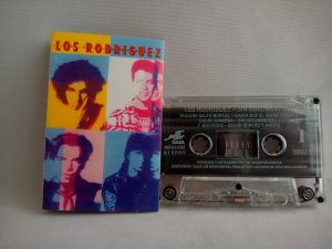 Los Rodríguez: Sin Documentos, Los Rodríguez, venta cassettes Los Rodríguez, venta cassettes de colección, Rock Latino, Pop Rock, venta cassettes de Rock Latino,venta cassettes de Pop Rock, AvionRojo: Tienda de vinilos y cassettes, venta cassettes usados